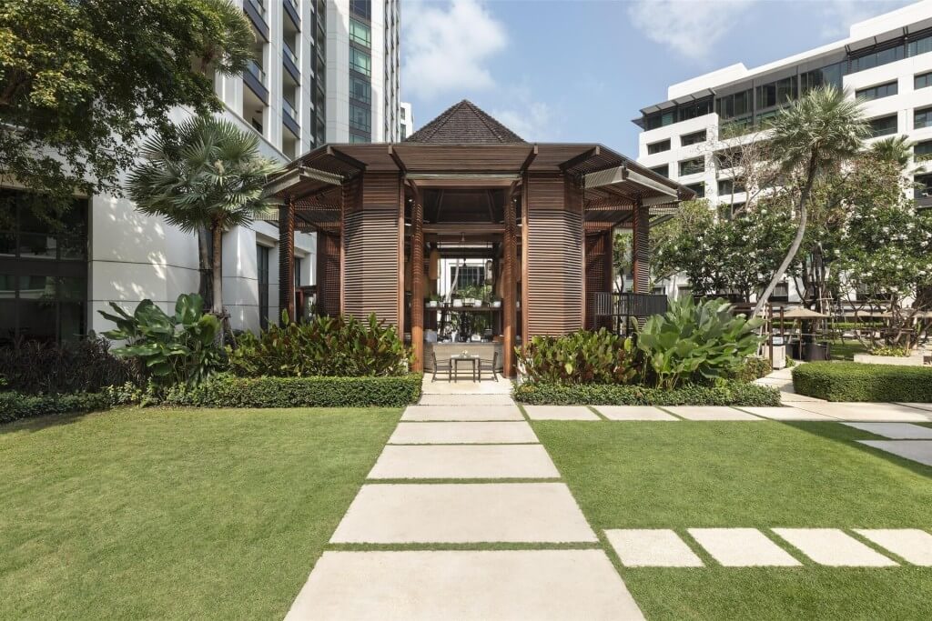 Siam Kempinski Hotel Bangkok central courtyard garden with lush green landscape
