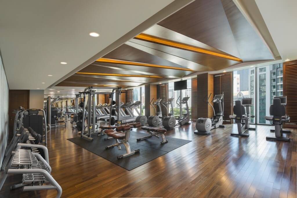 Siam Kempinski Hotel Bangkok gym with cardio machines and weight training equipment