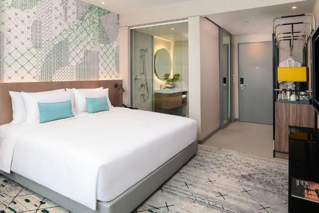 Avani Sukhumvit Bangkok double room entrance with bathroom on one side and minibar on the other