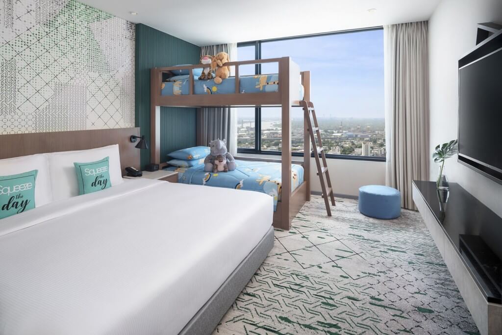 Avani Sukhumvit Bangkok family room with double bed and wooden bunk bed for 2 adults 2 kids