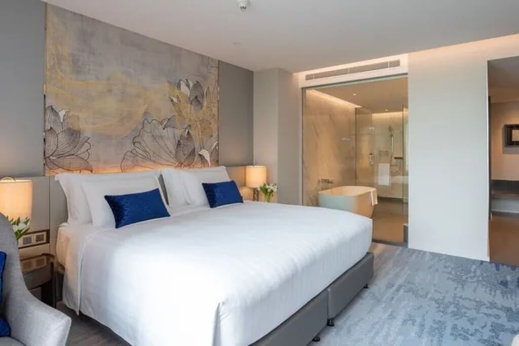 Chatrium Grand Bangkok deluxe room view from bed to bathroom