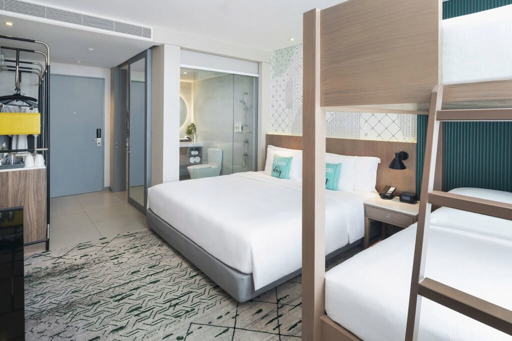 Avani Sukhumvit Bangkok family room warm wooden bunk bed and cabinet details