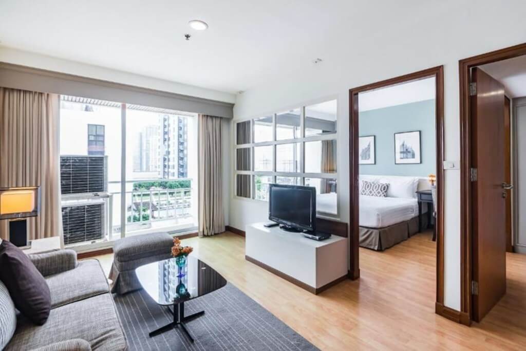 Living room view to bedroom in One Bedroom Suite at Evergreen Place Siam by UHG