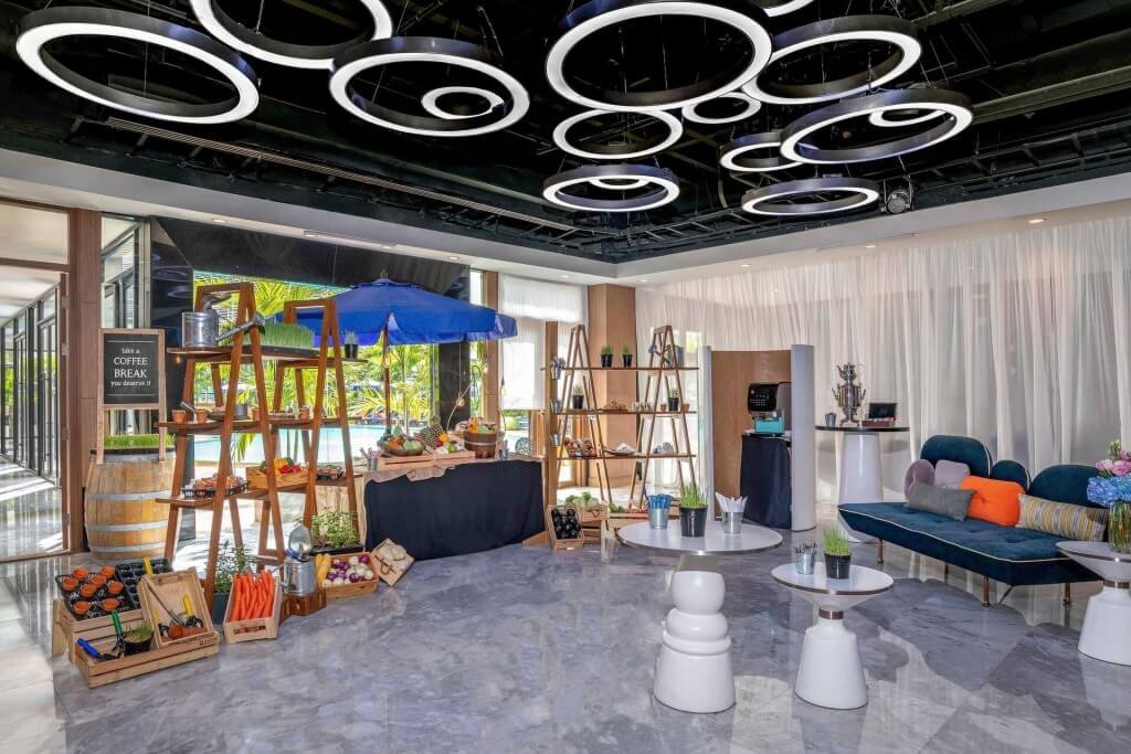 Novotel Bangkok Siam Square breakfast restaurant entrance with tropical wooden decor