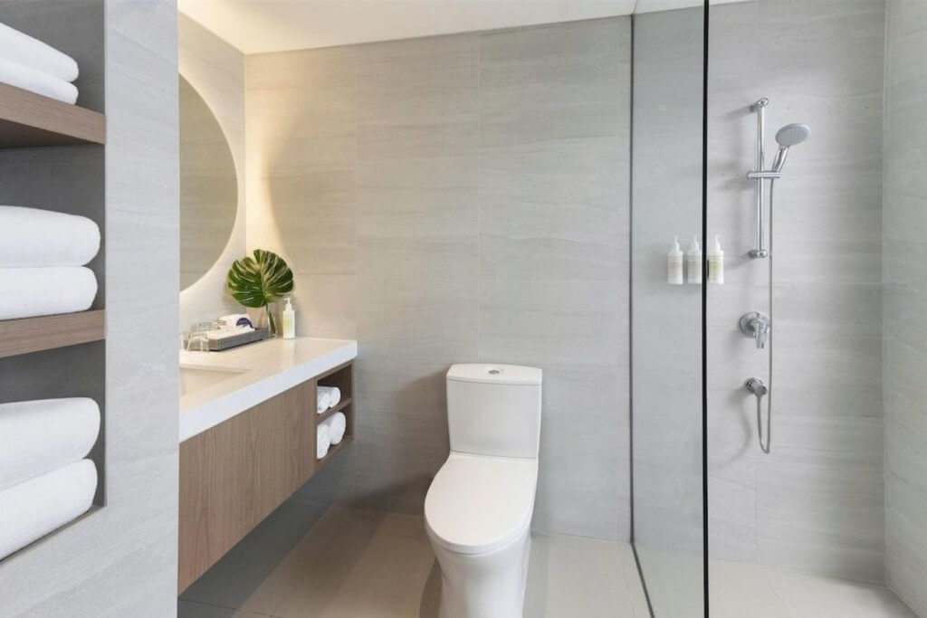 Avani Sukhumvit Bangkok bathroom shower with glass screen keeping water inside