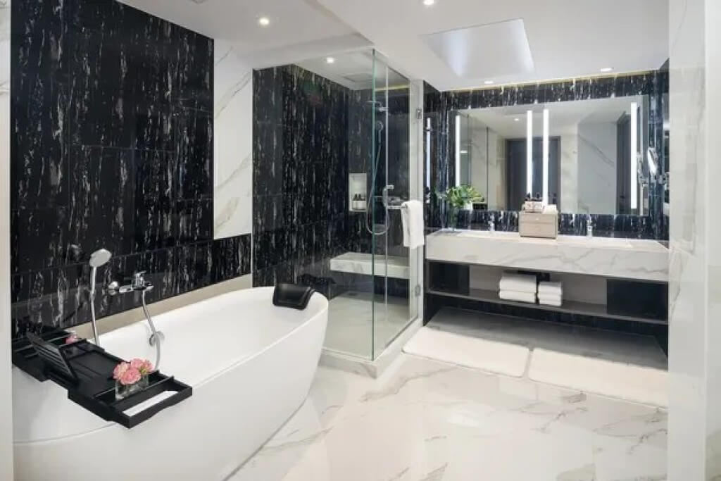Pathumwan Princess Hotel one bedroom suite bathroom with egg-shaped bathtub