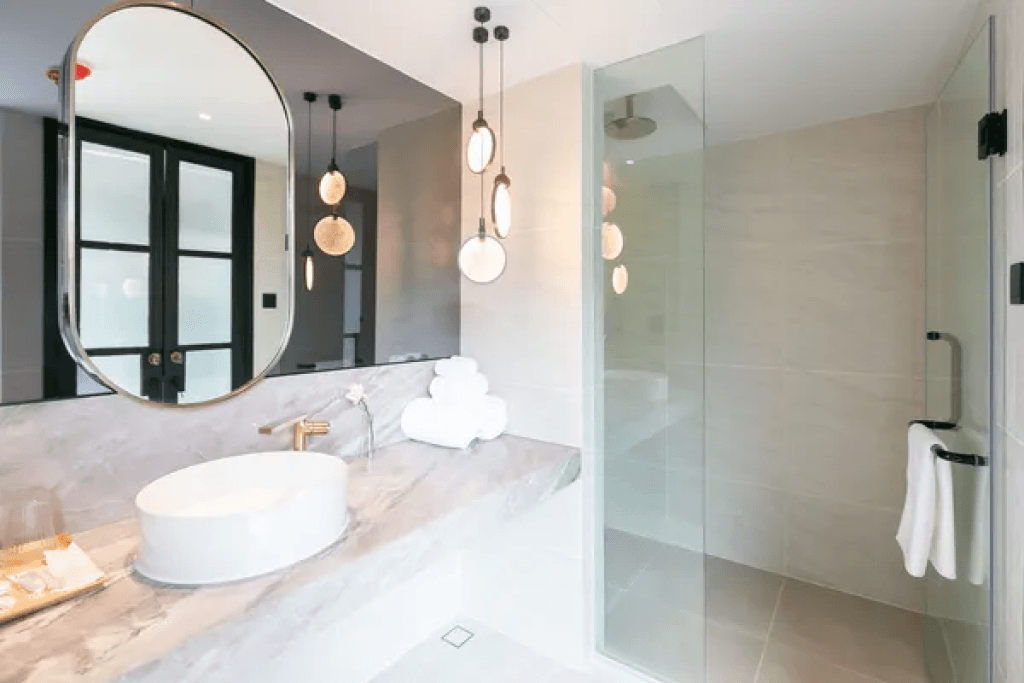 Sink and shower area in double suite at Sacha Thonglor